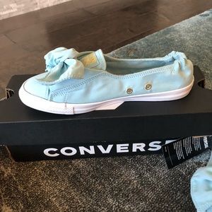 Brand new baby blue converse slip ons.